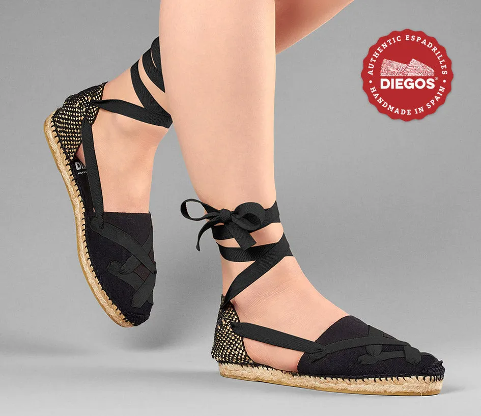 Alpargatas planas Lola clásicas todo negro con cordones