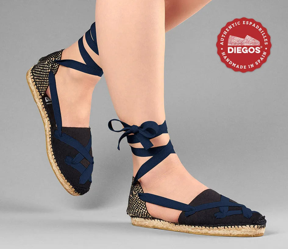 Alpargatas planas Lola clásicas todo negro con cordones