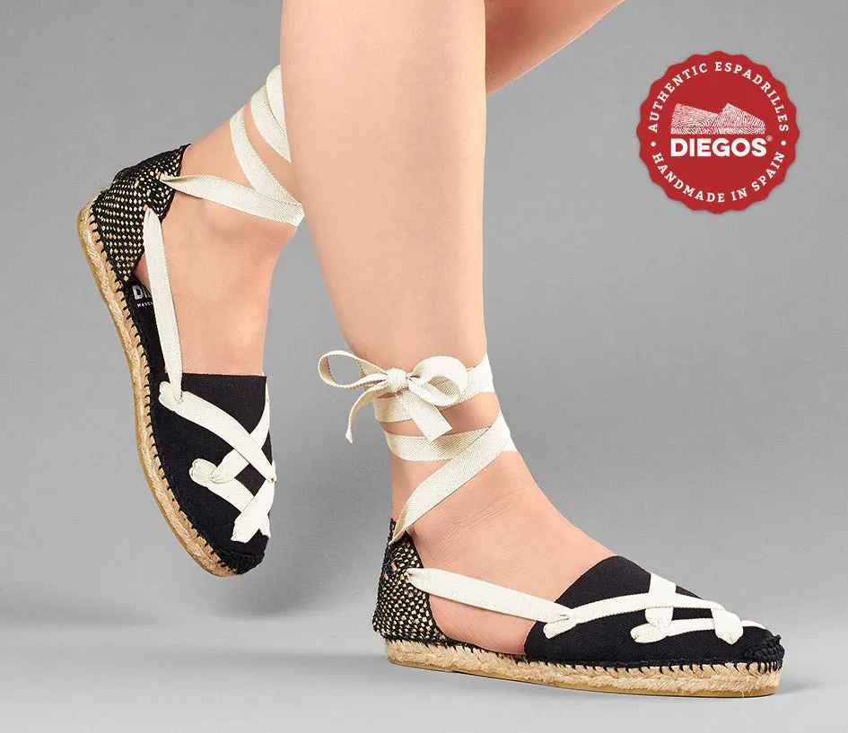 Alpargatas planas Lola clásicas todo negro con cordones