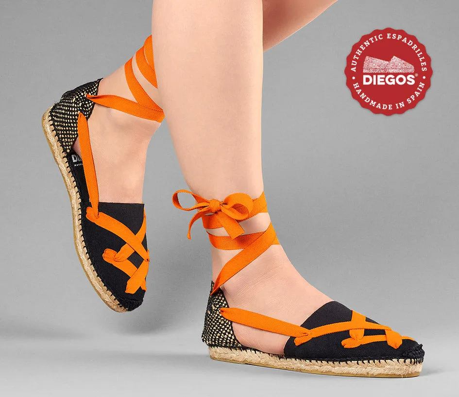 Alpargatas planas Lola clásicas todo negro con cordones